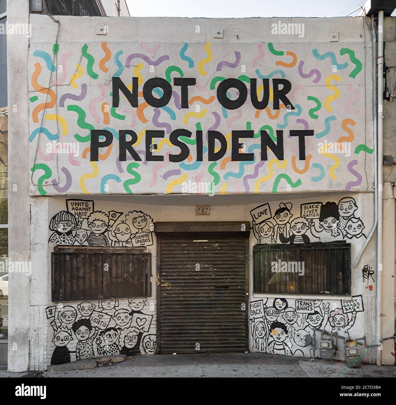 A day shot of protest graffiti on a shop front, downtown LA, California, USA. Stock Photo