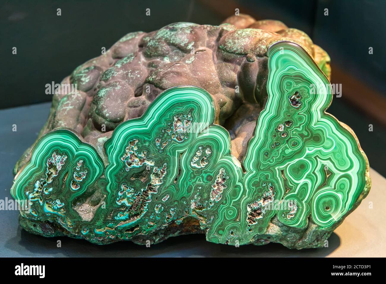 Sample of malachite, a copper carbonate hydroxide mineral. This sample was found in the Urals mountains of Russia. Stock Photo