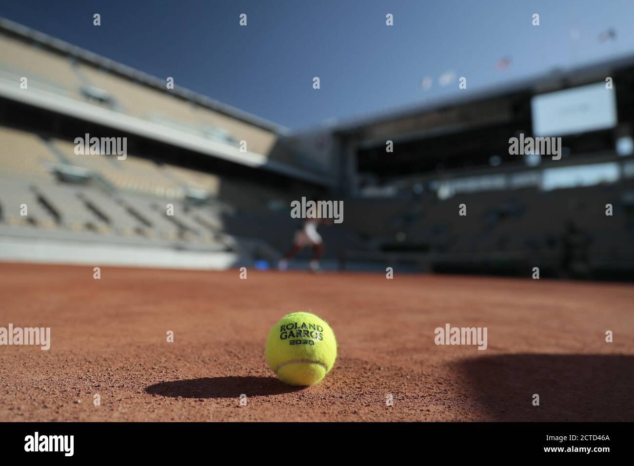 Illustration of official tennis ball Roland Garros 2020 by Wilson over the clay of Philippe Chatrier court under the CoVid health crisis 19 during the Stock Photo