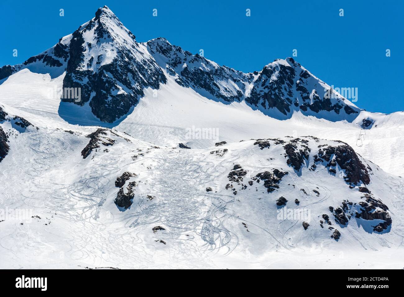 Snowy mountainous landscape in Stubai Glacier area in Tyrol, Austria, with ski area and lifts. Stock Photo
