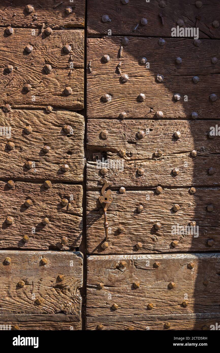Old oak studded wooden doors hi-res stock photography and images - Alamy