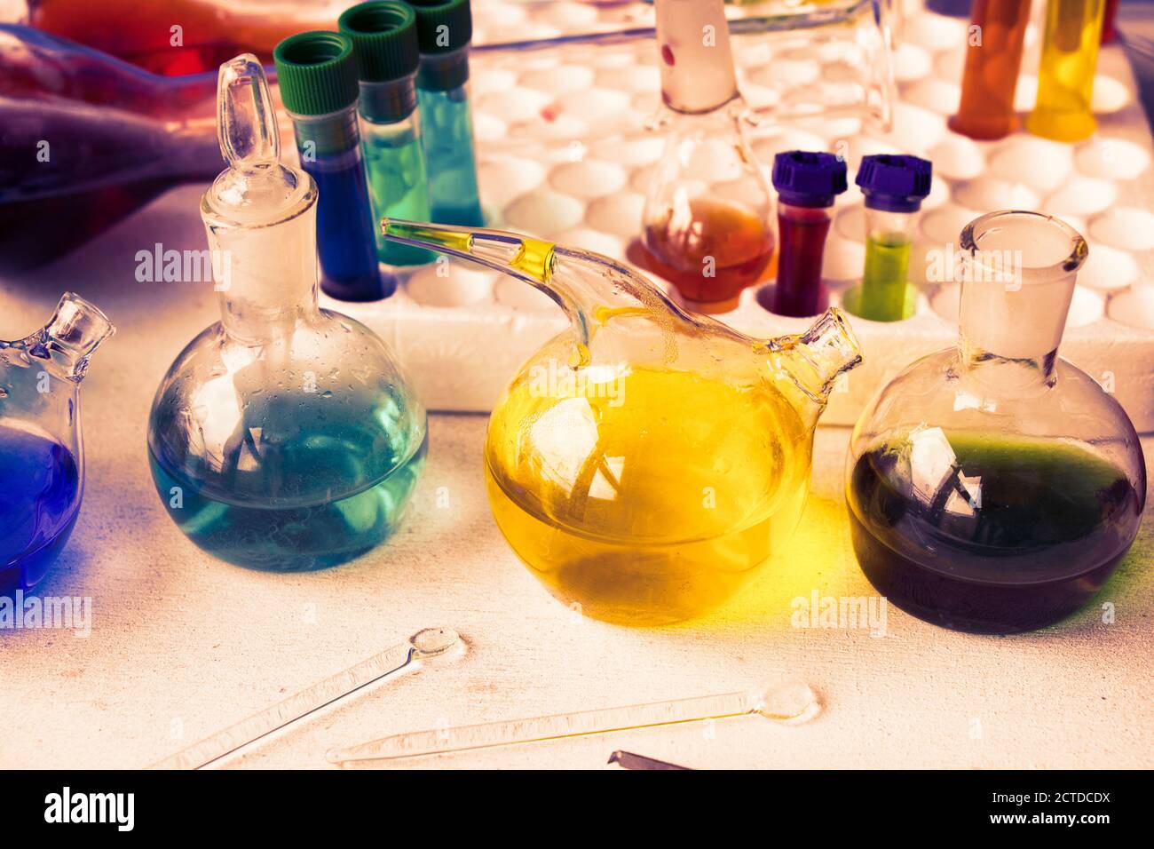 Laboratory instruments, glassware and reagents, colorful liquid ...