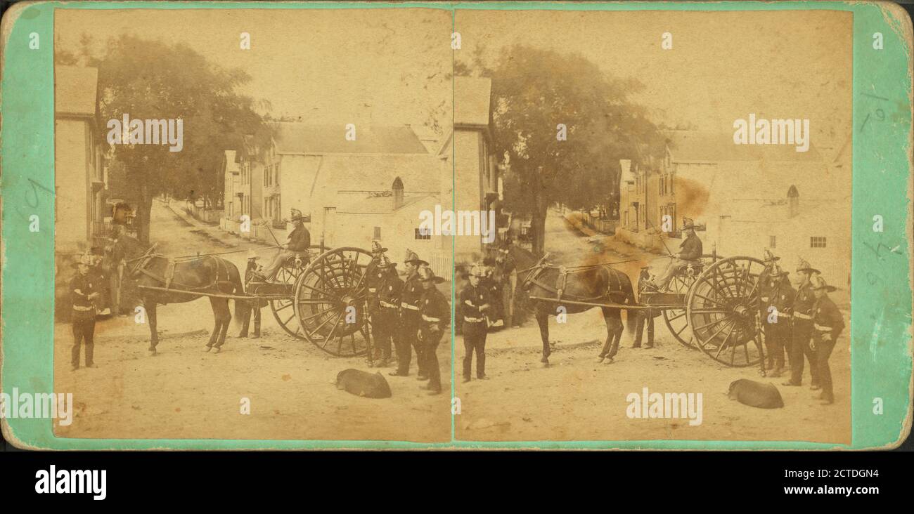 Fire fighting equipment, hose cart and men in uniform., still image, Stereographs, 187, Warren, Joseph H Stock Photo