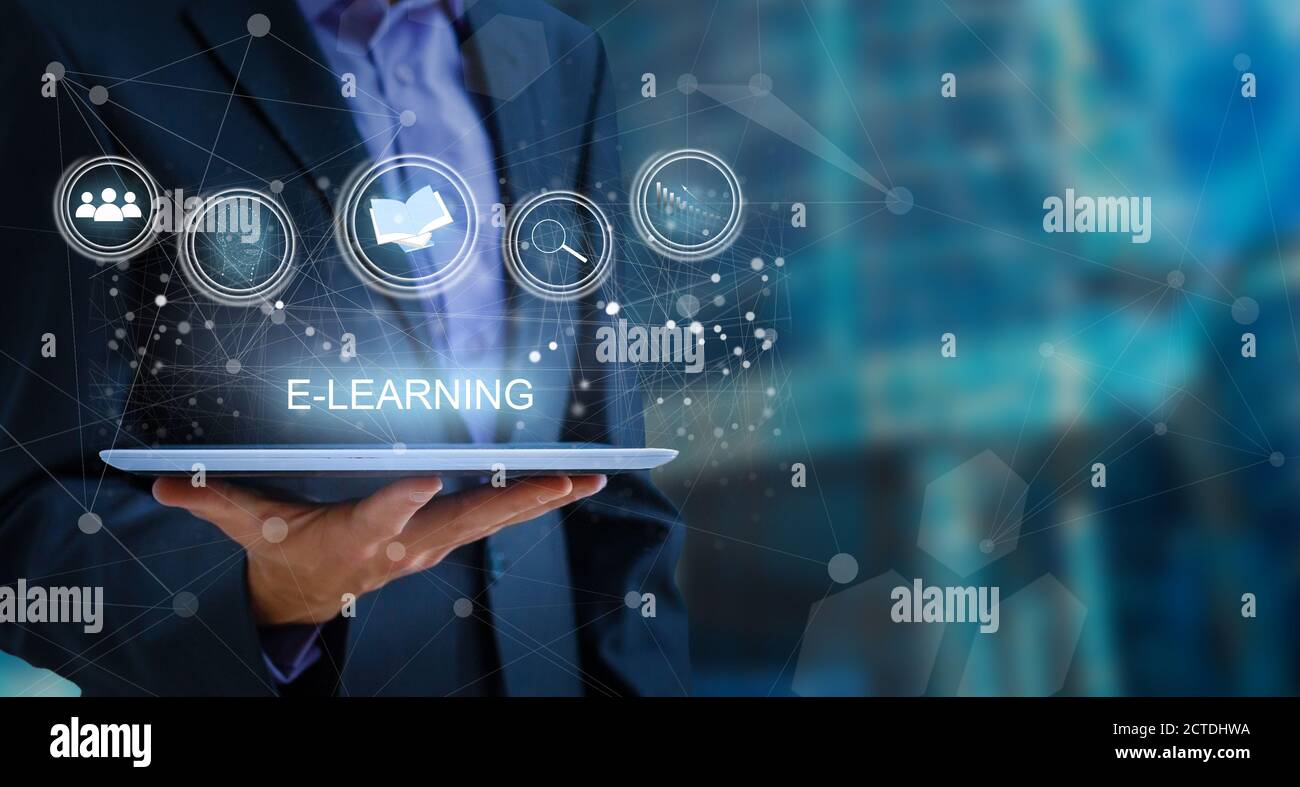 hand pressing learning word button. business concept. e learning Stock Photo