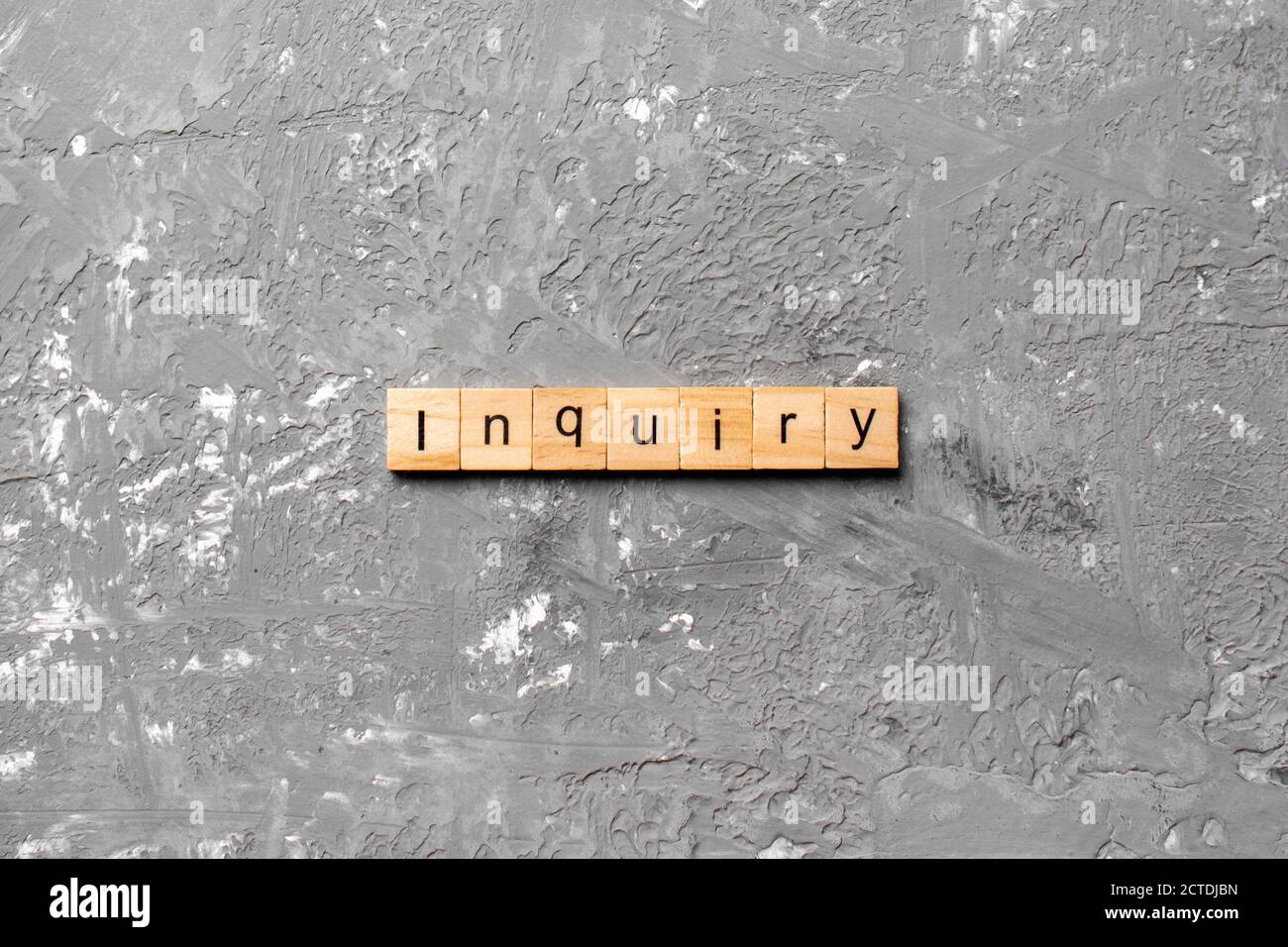 inquiry word written on wood block. inquiry text on table, concept ...