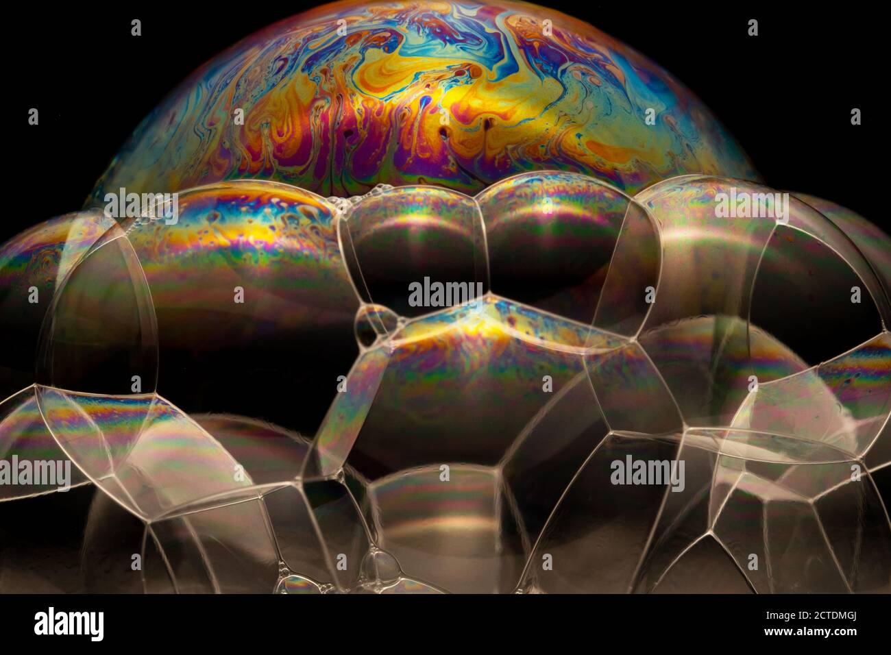 Close-up footage of a soap multiple bubbles with colorful surface Stock ...