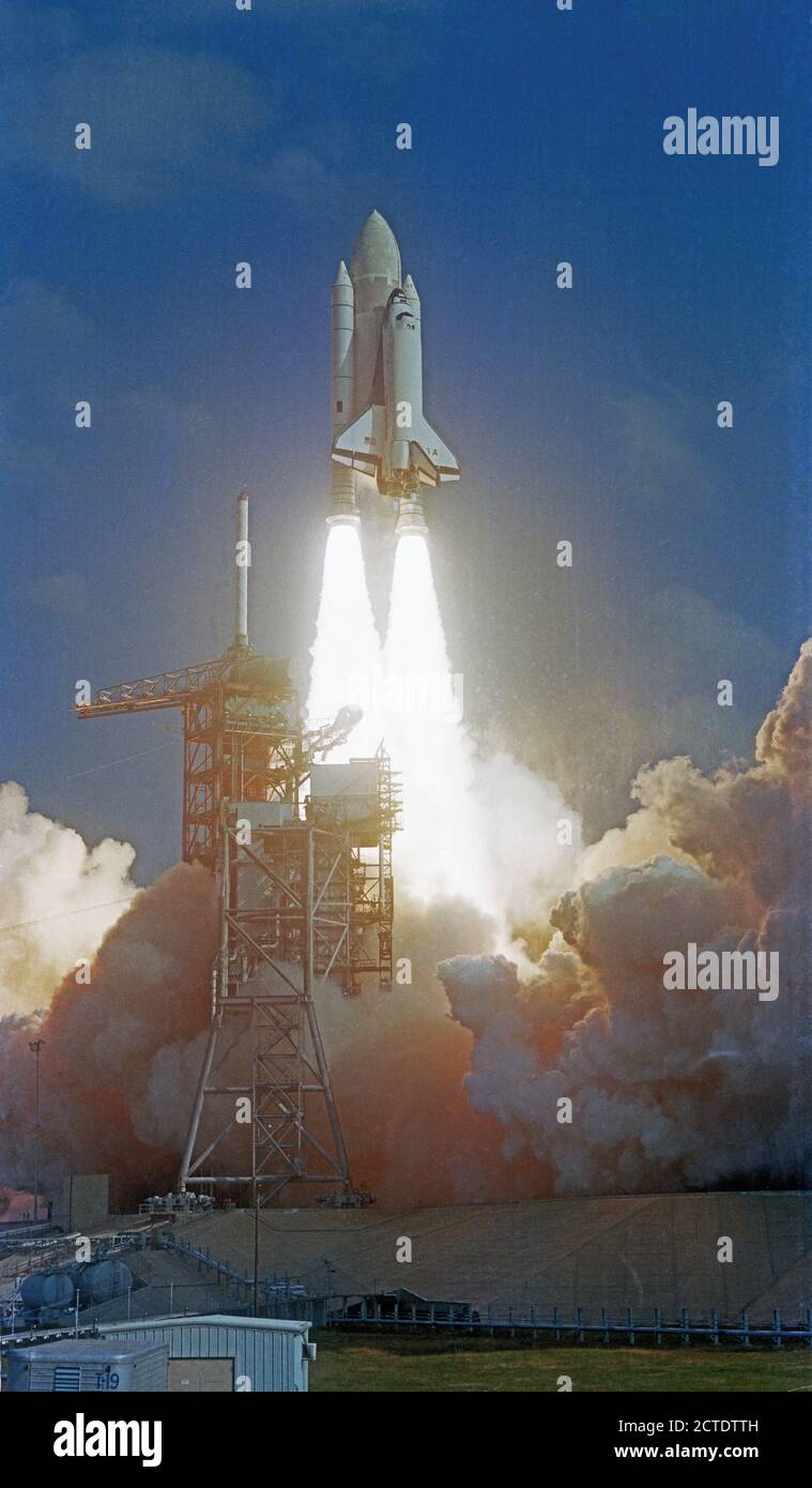 Space Shuttle Orbiter Columbia mated to its external fuel container (ET) and two solid rocket boosters (SRB) lifts off from Launch Pad 39A for the begining of STS-2. Stock Photo