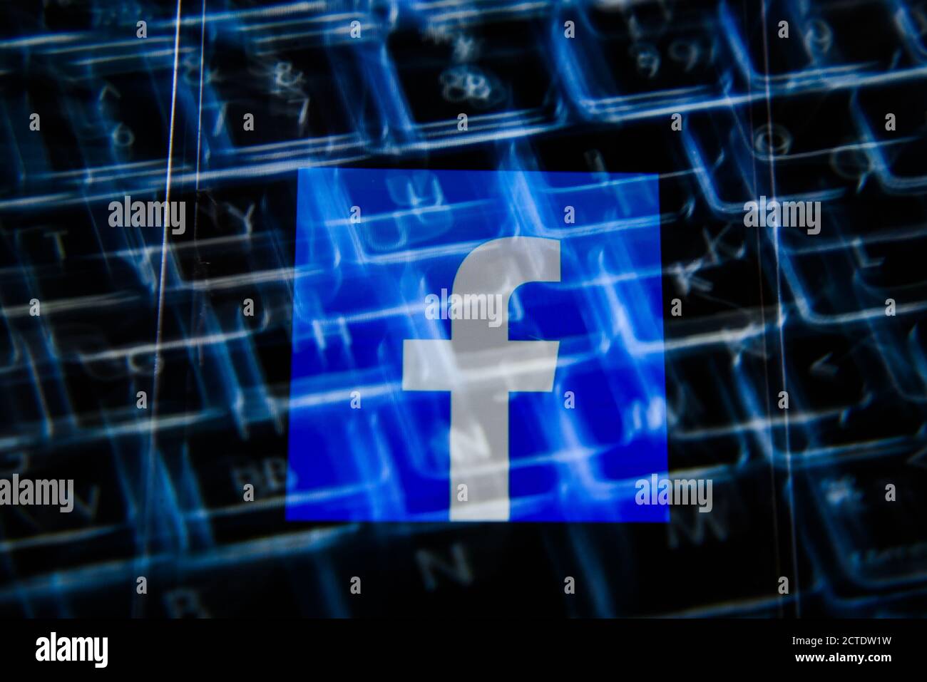 In this photo illustration a Facebook logo seen displayed on a ...