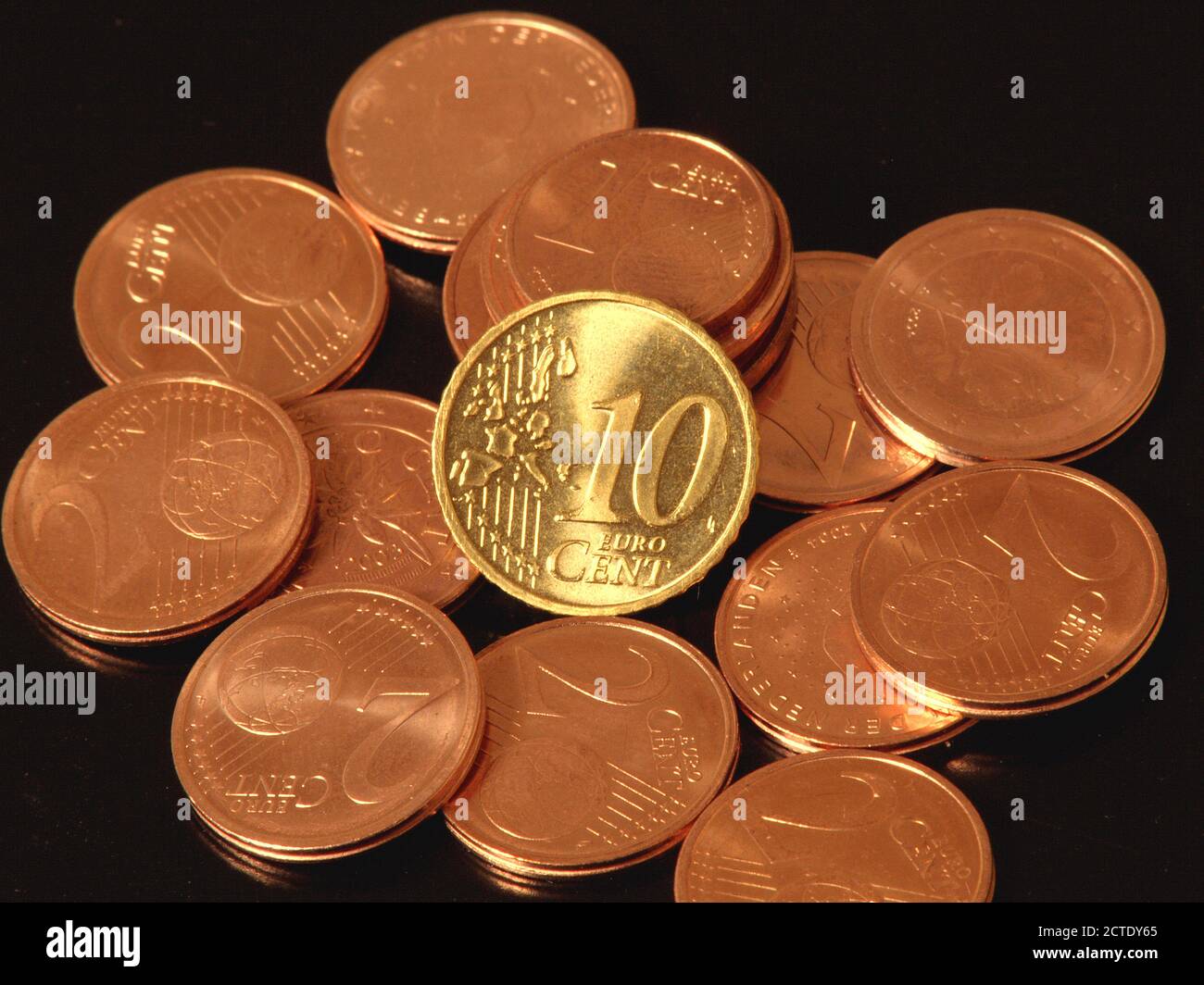 Euro cent coins on black background, Europe Stock Photo