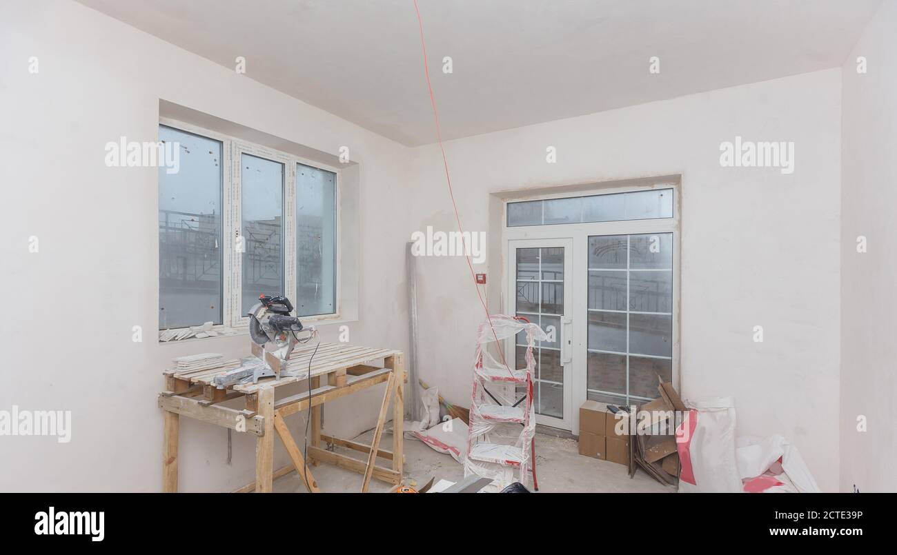 Remodeling attic bathroom with drywall repair, plastering painting