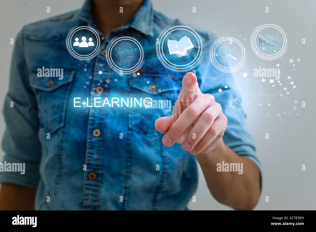 hand pressing learning word button. business concept. e learning Stock Photo