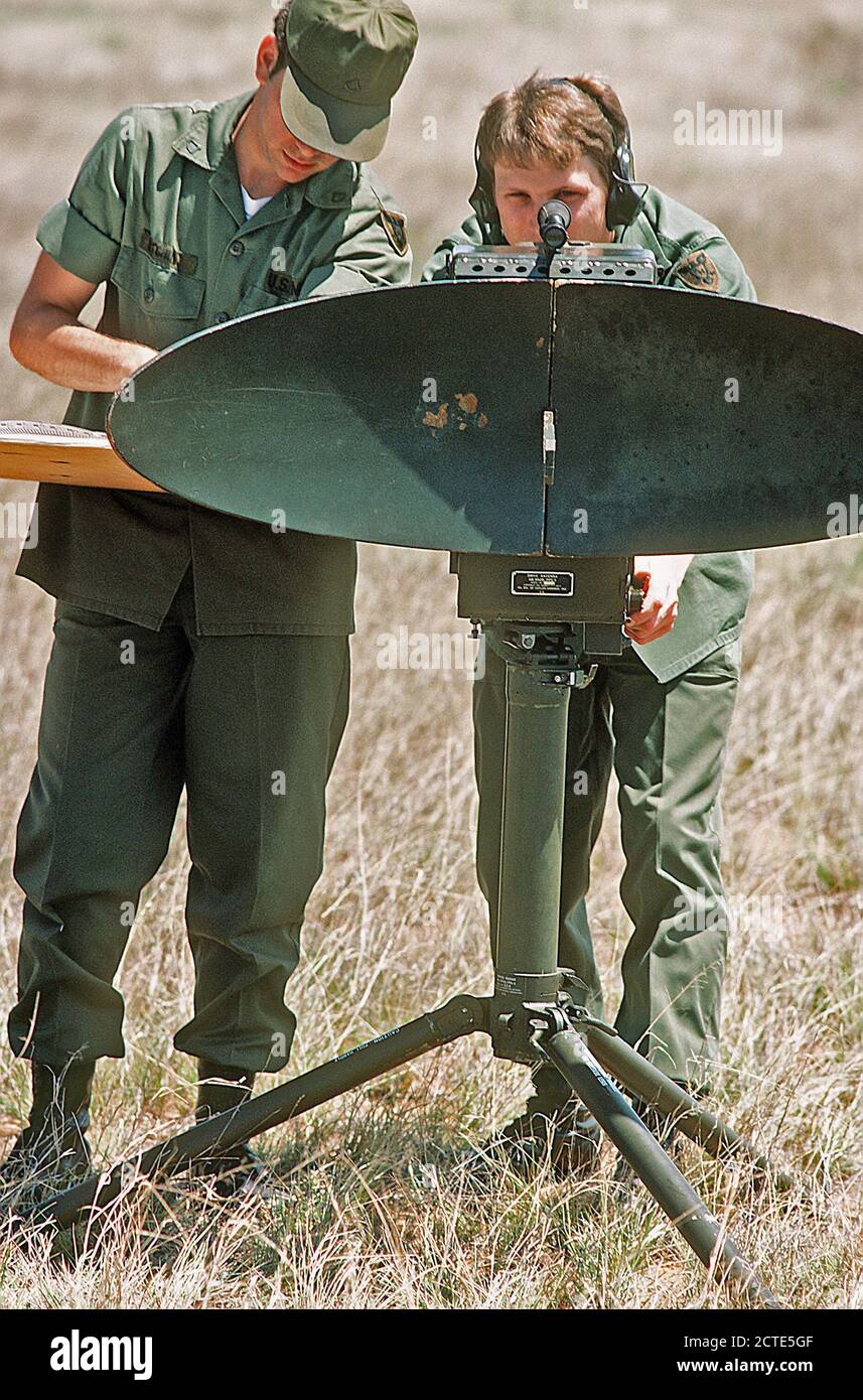 1978 - U.S. Army ground radar technicians operate an AN/PPS-5 combat surveillance radar systems. Stock Photo