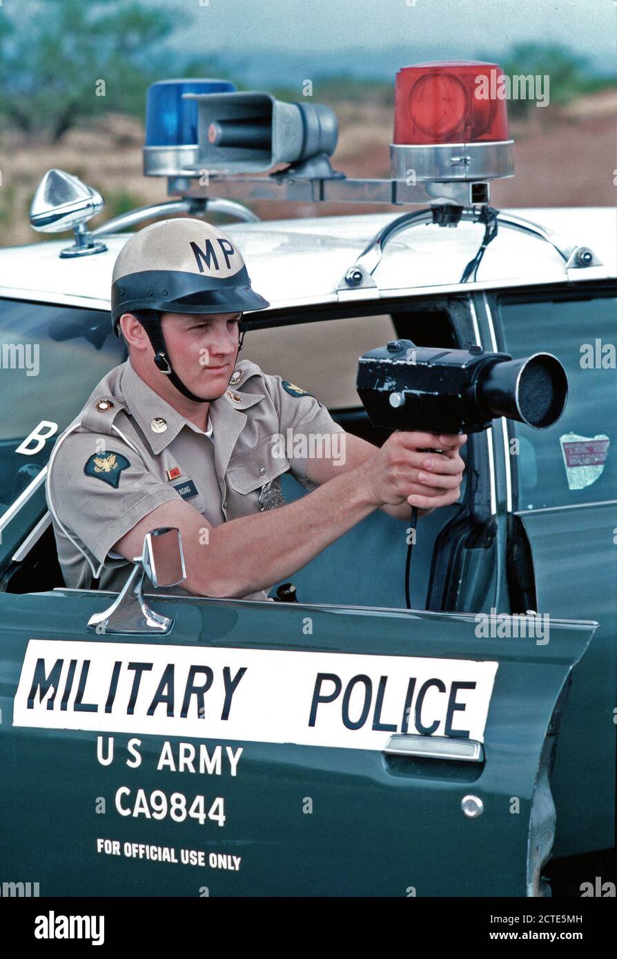Policeman using speed radar gun hires stock photography and images Alamy