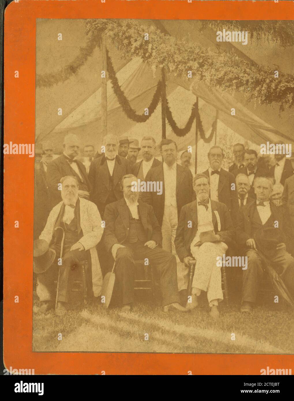 Men seated and standing in festooned tent., Beckwith, E. W., 1878, Pennsylvania Stock Photo