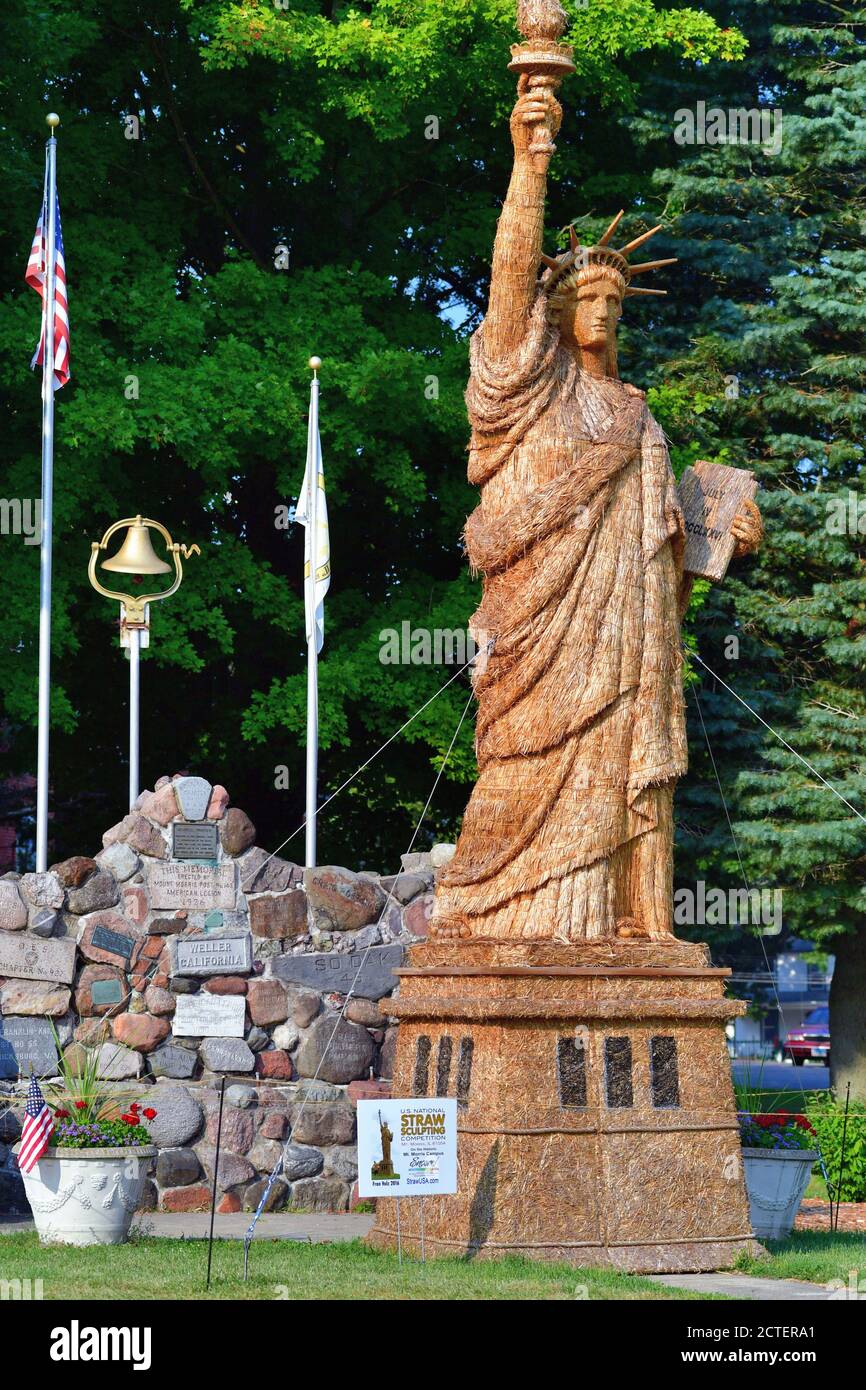 Mt. Morris, Illinois, USA. An entry at the Mt. Morris straw sculpting competition that replicates the Statue of Liberty. Stock Photo