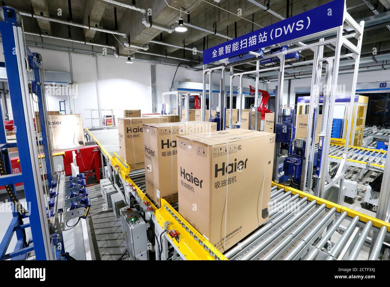 Large and bulky boxes are delivered at an unmanned smart warehouse ...