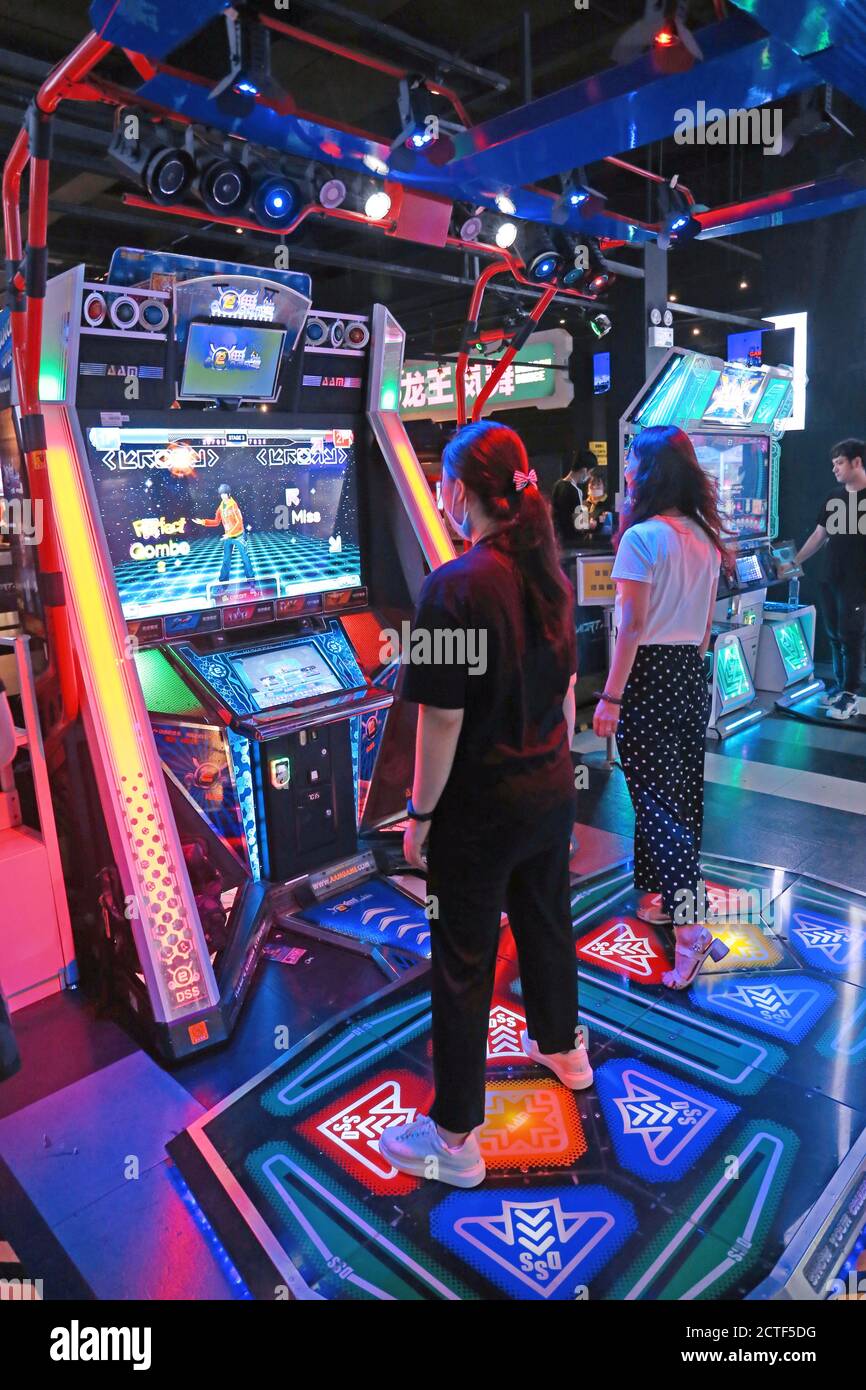 Tourists enjoy various kinds of video games including virtual reality