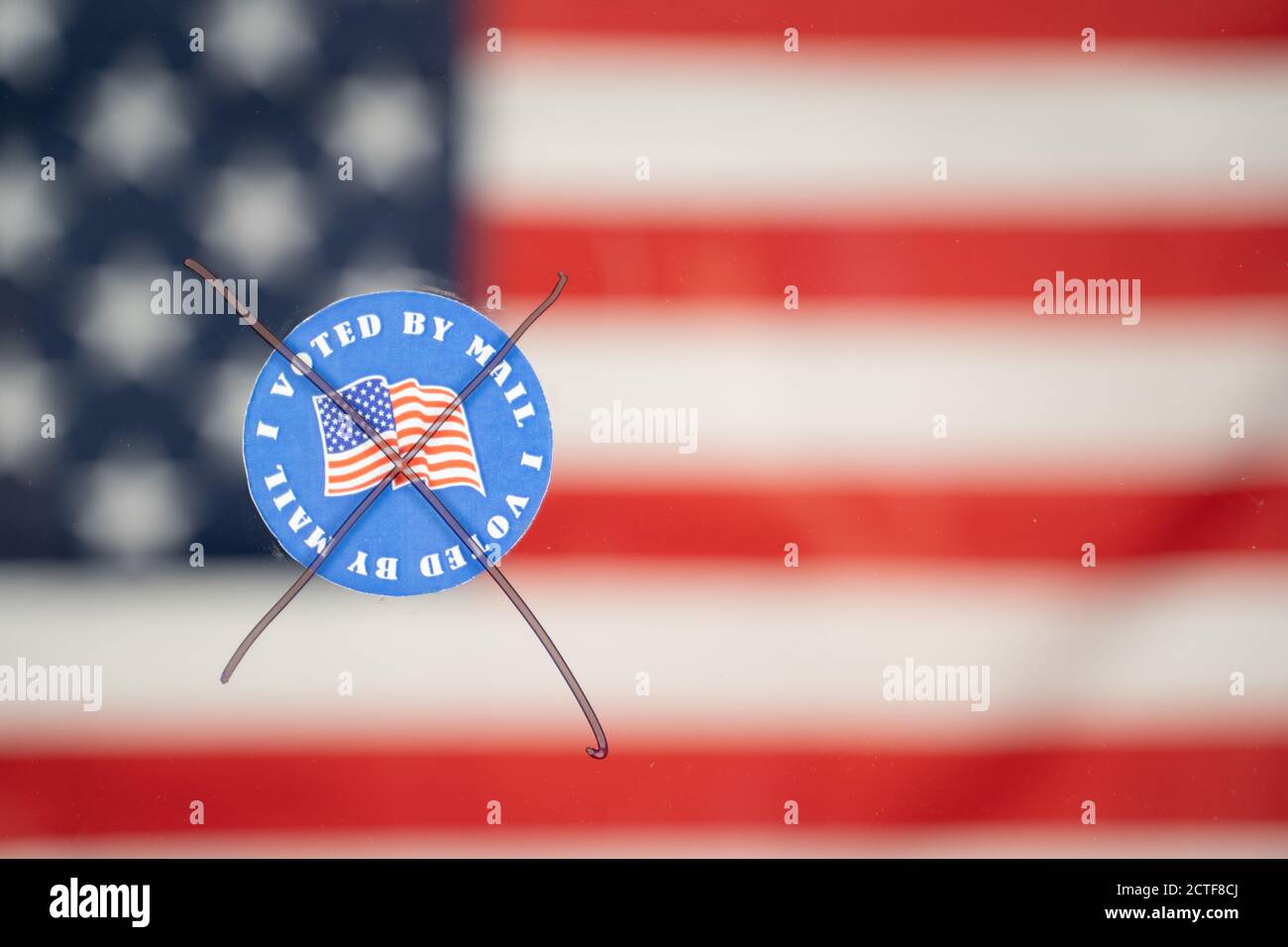 Cancelled out I voted by Sticker with US flag as background with copy space - Concept against mail in voting during USA elections Stock Photo