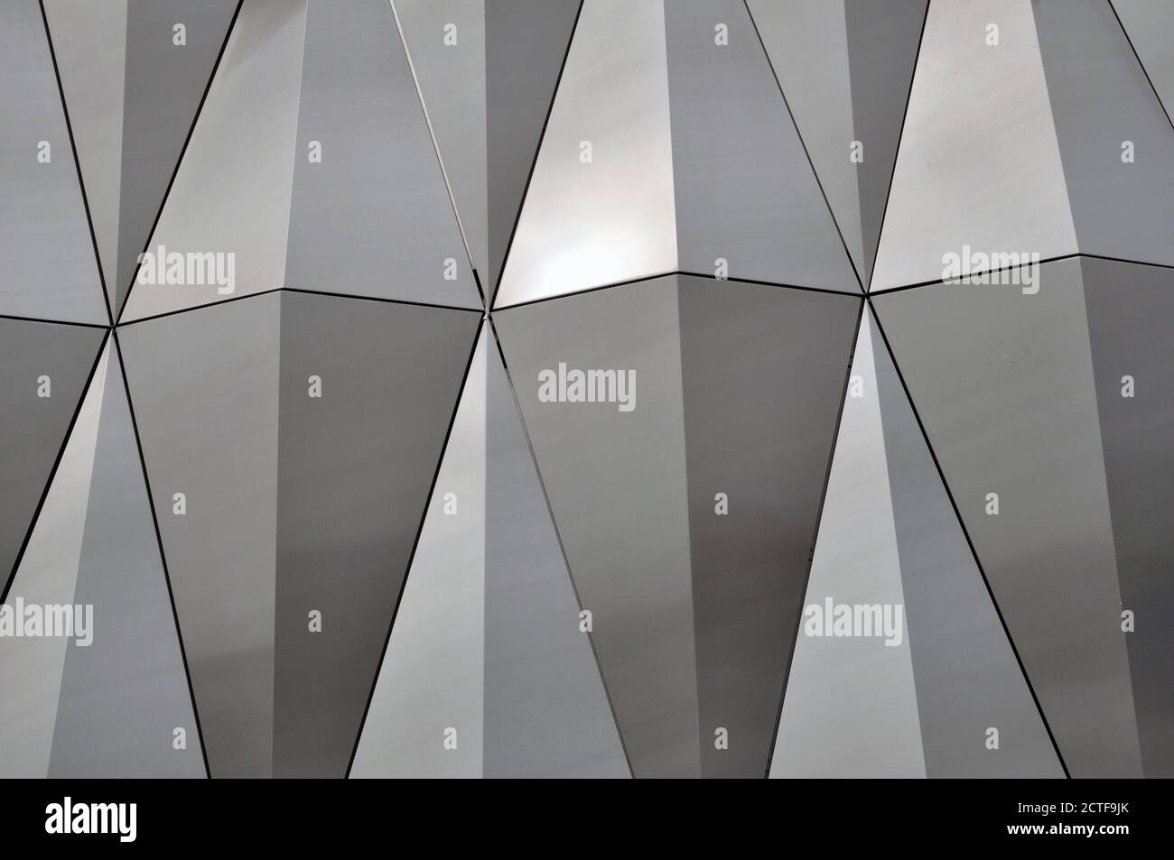 Crystal-shaped stainless steel mirror surface. Wall decoration. Stock Photo