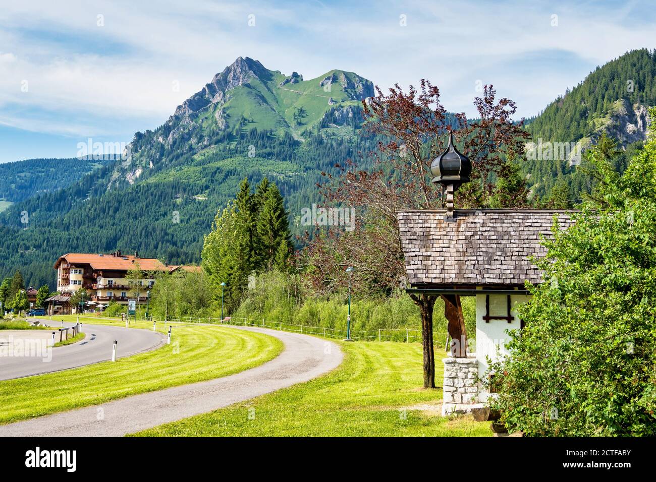 The Aggenstein in the Allgaeu Alps from the Tyrol, Austria. Wooded slopes and rugged summit. View to the Aggenstein in the Allgaeu Stock Photo
