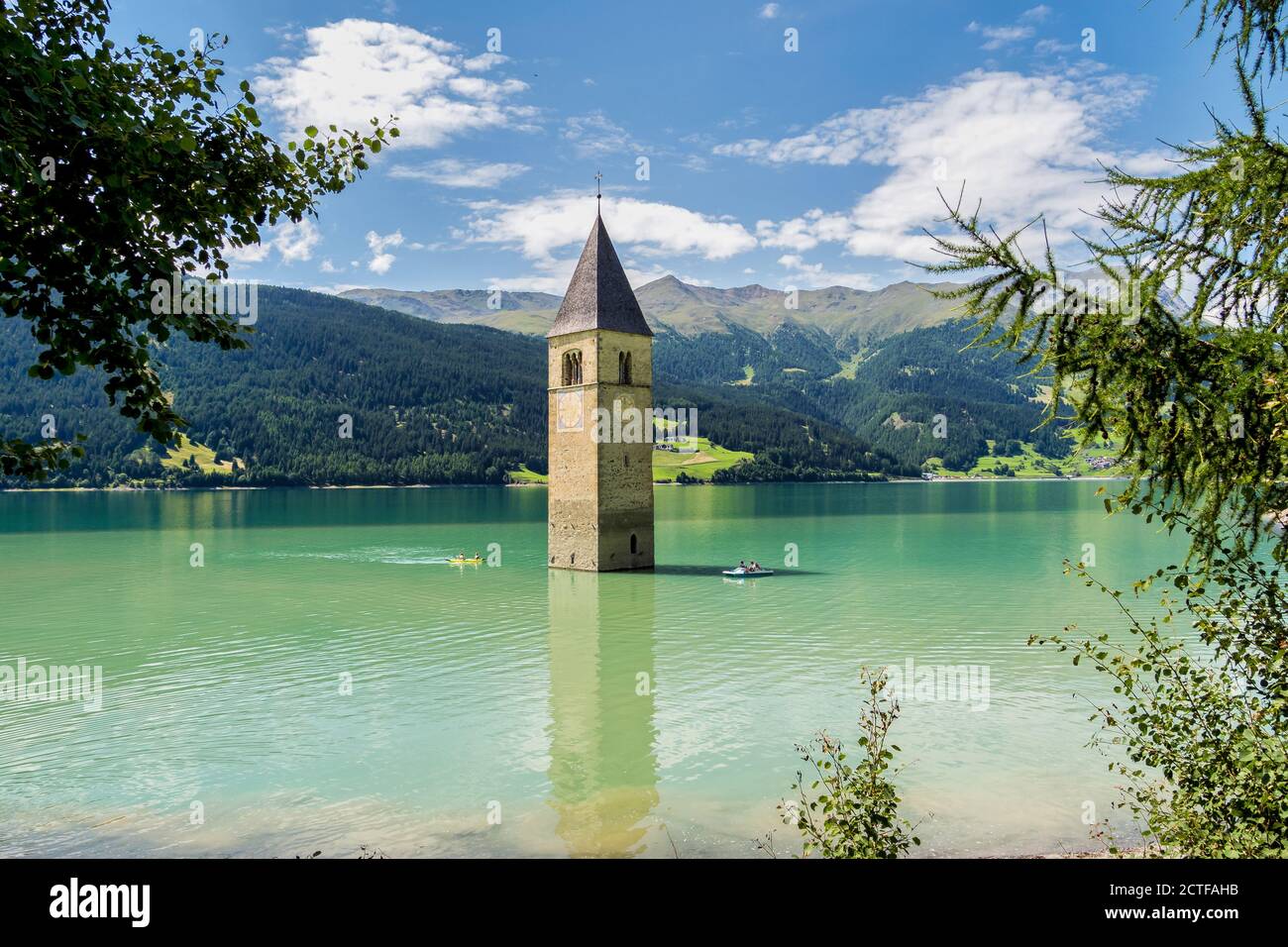 The famous bell tower in the Lake of Reschen - Lago di Resia in South Tyrol, Italy. During WW2 a dam was build and put the village under water, only t Stock Photo