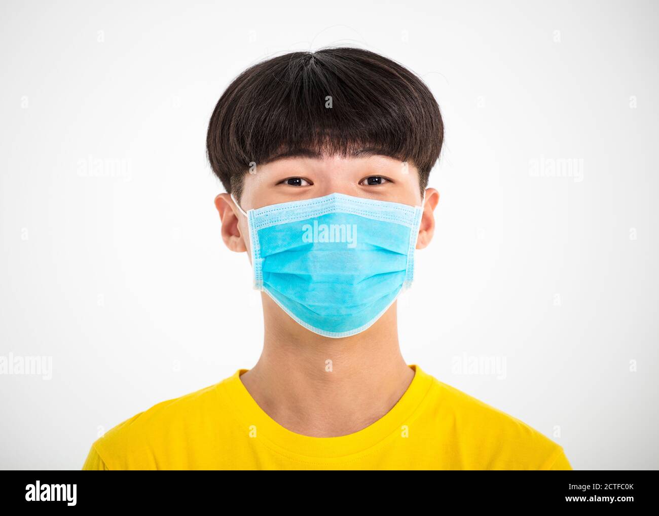 Close up portrait of teenage Asian boy wear medical mask Stock Photo ...