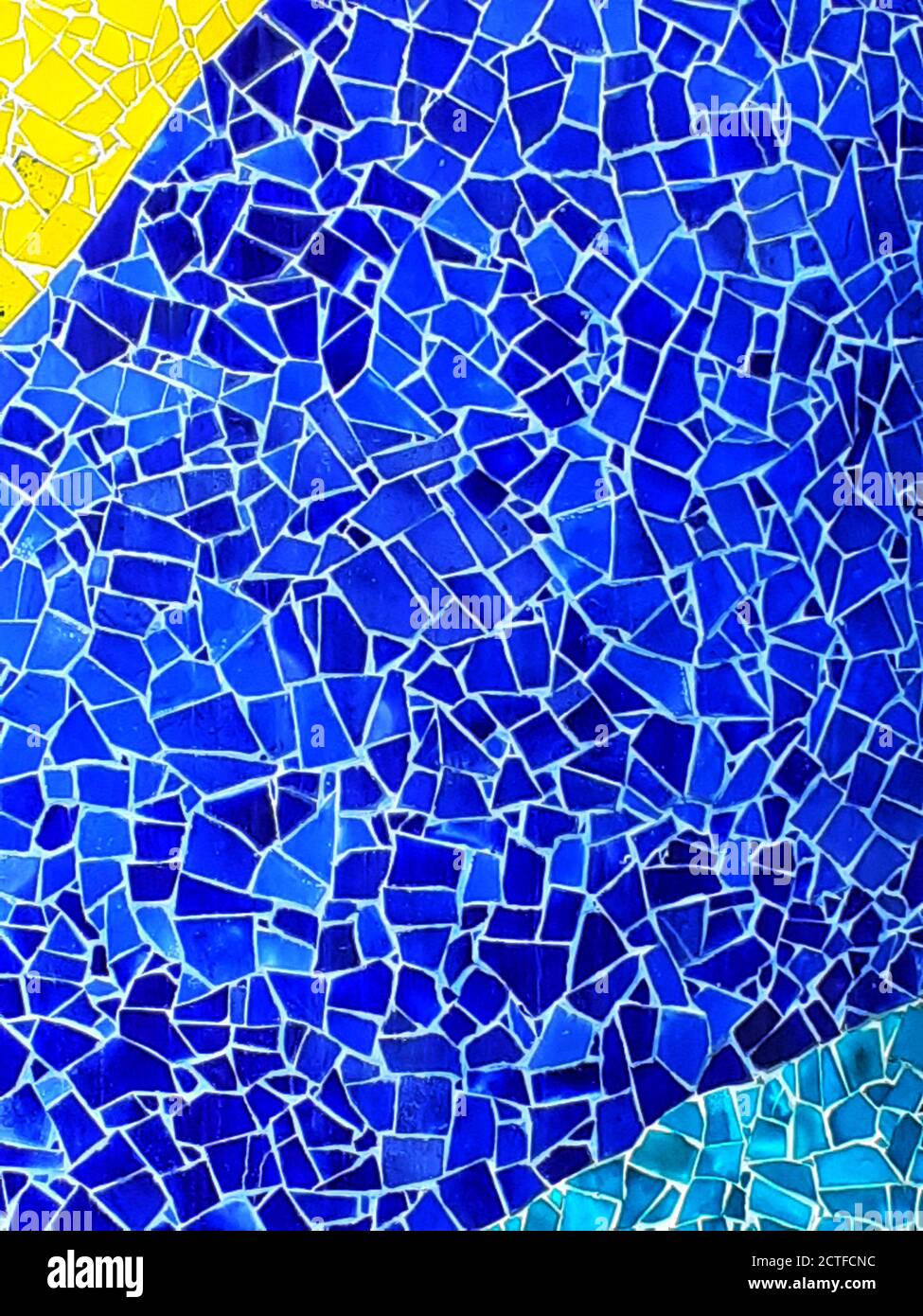 Wall of blue broken tiles mosaic Stock Photo - Alamy