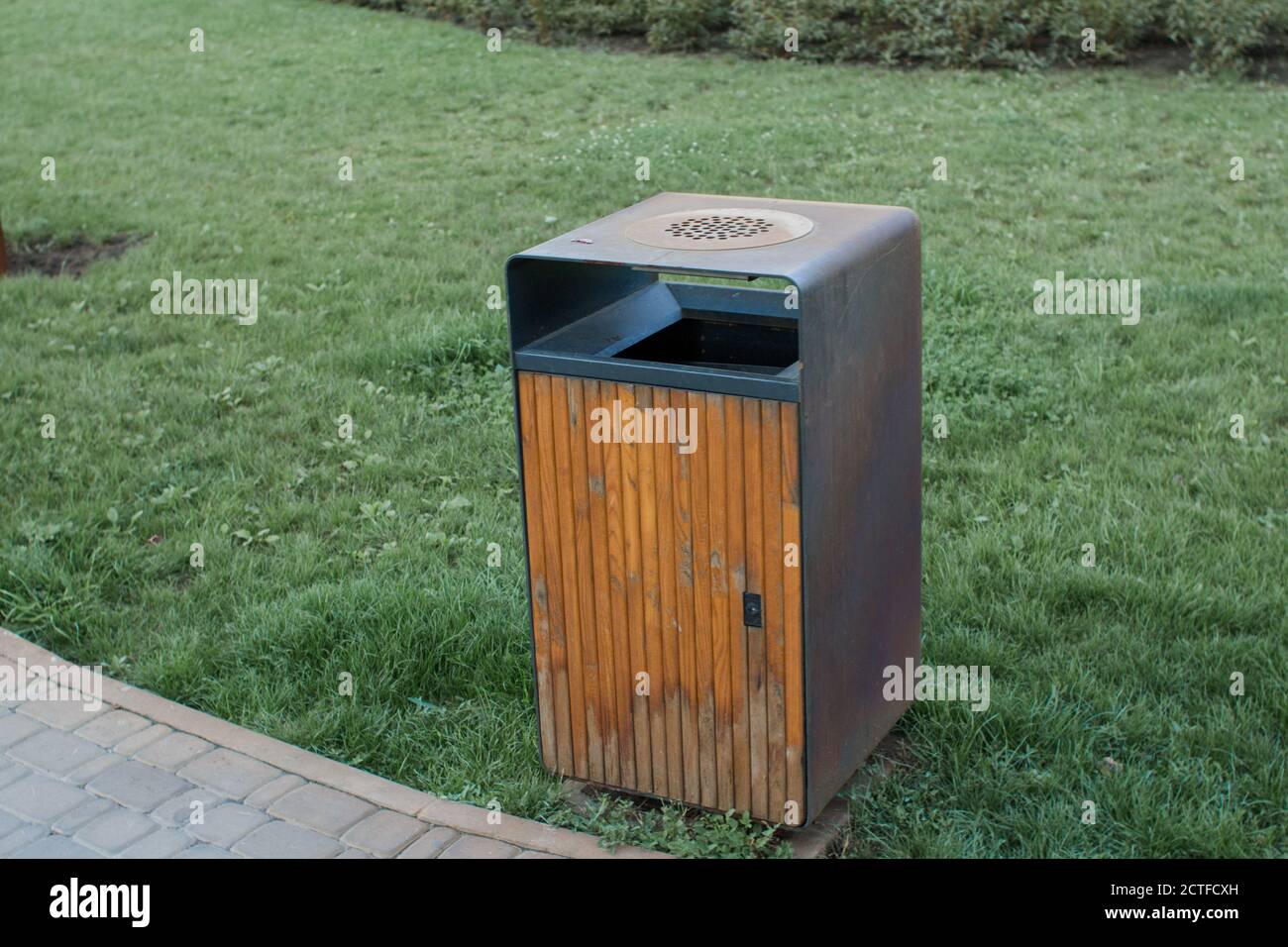 a new trash can in green park Stock Photo Alamy