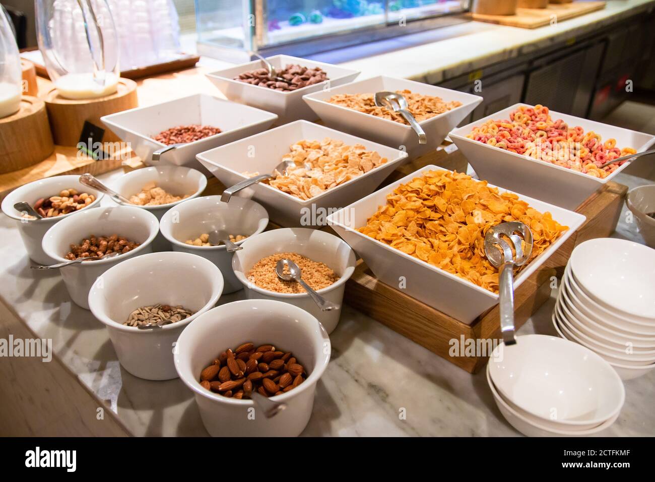 Various type of cereals and nuts toppings at the morning breakfast buffet  all-you-can-eat Stock Photo - Alamy
