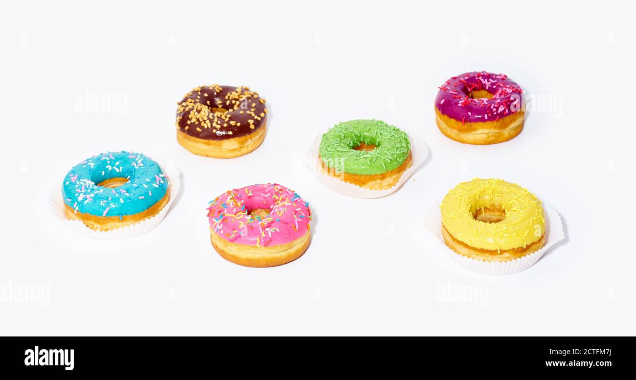 Sweet glazed donuts isolated on white background with copy space. Junk food Stock Photo