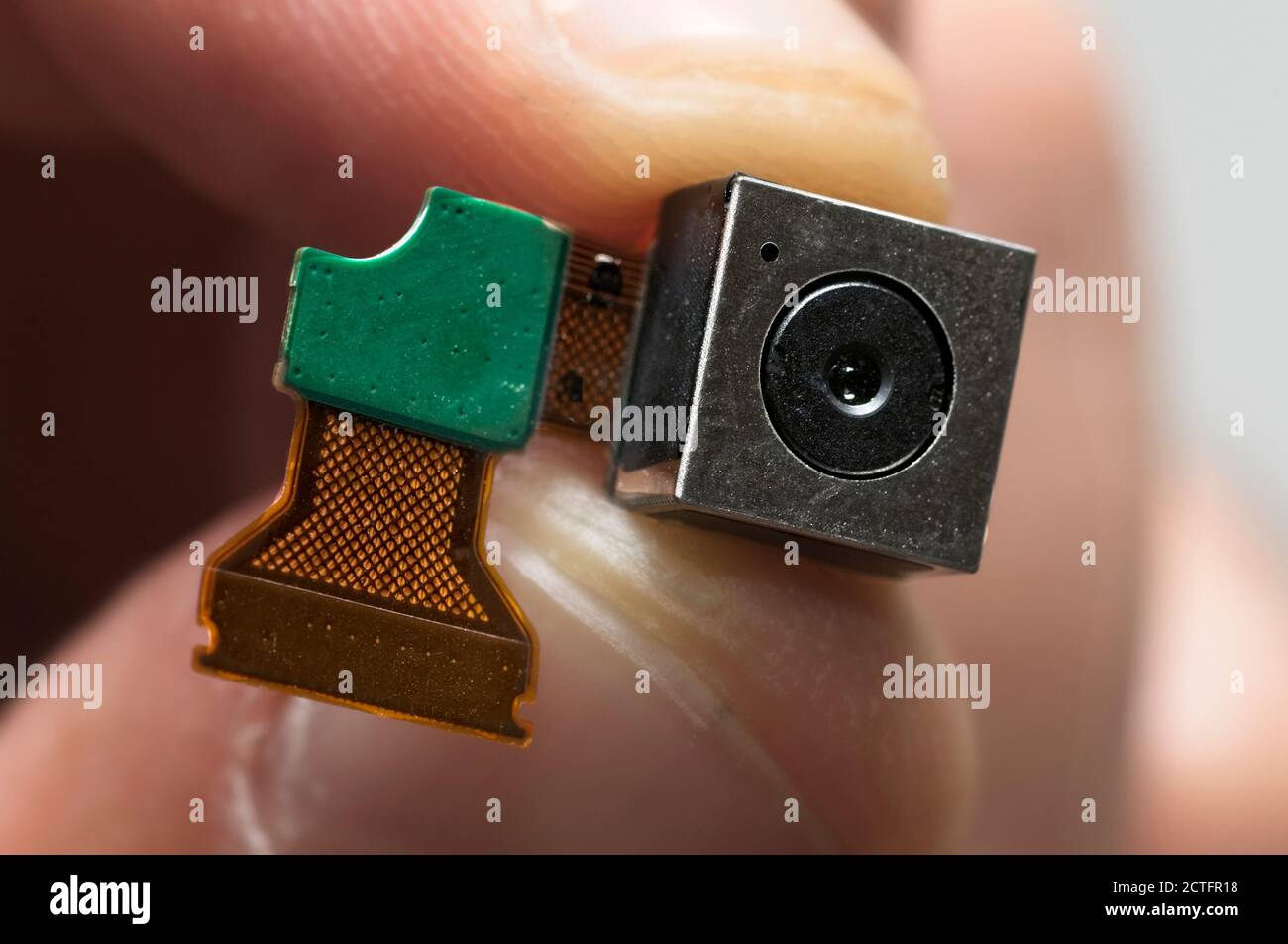 Lens, electronic circuit and sensor box of a micro camera. Stock Photo