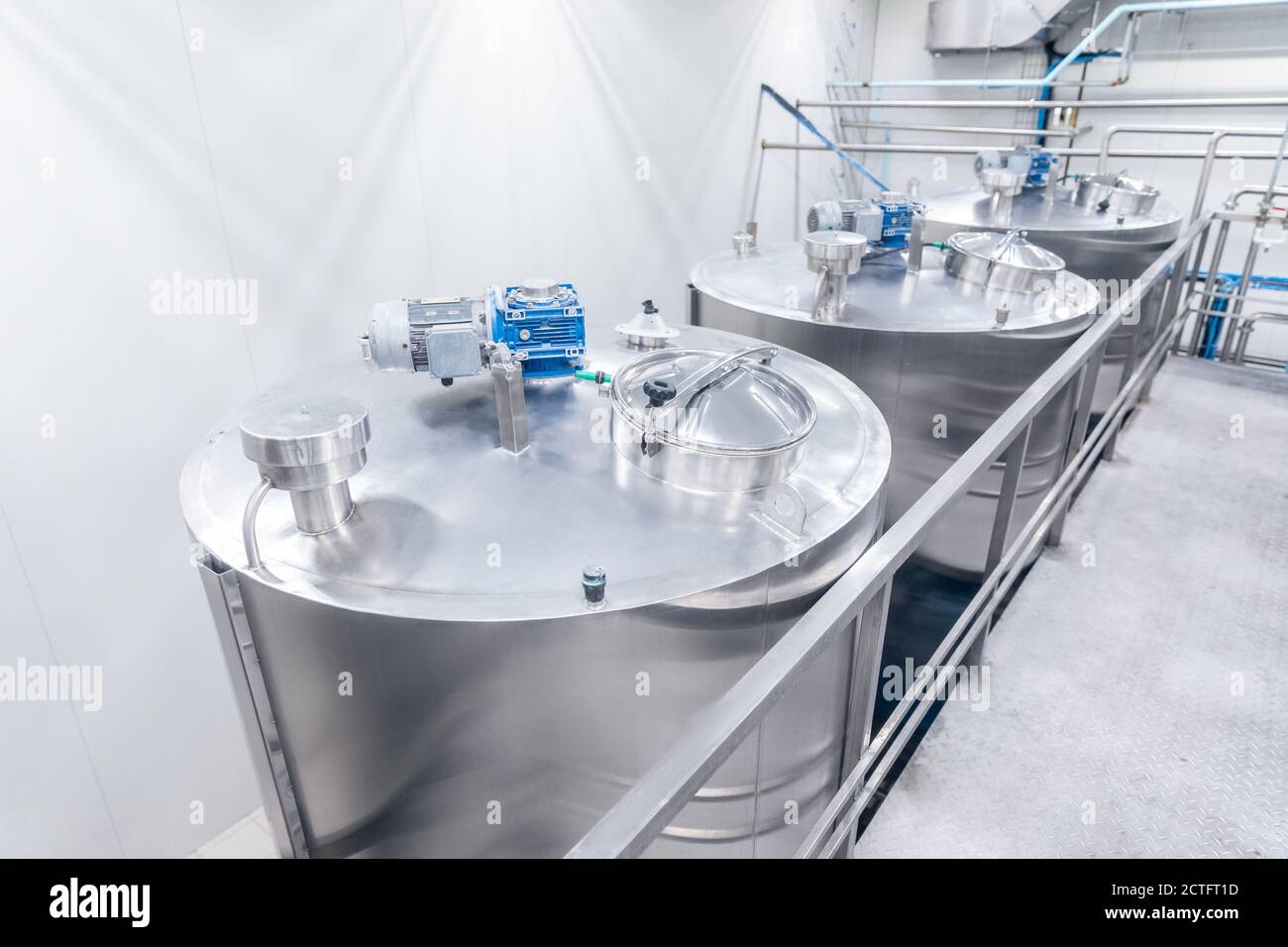 Milk factory industry, steel equipment dairy plant Stock Photo Alamy