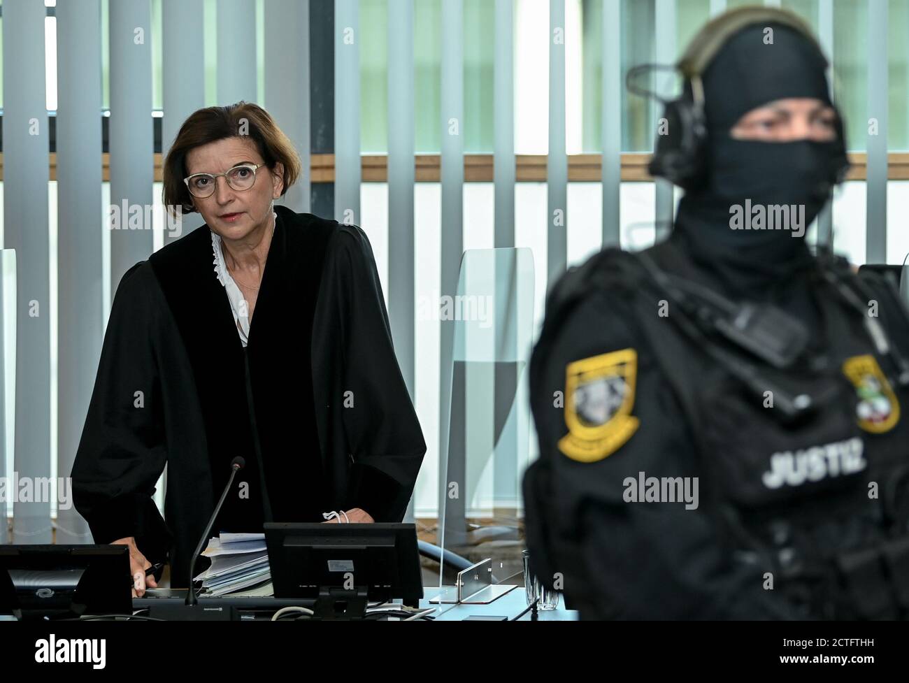 Magdeburg, Germany. 23rd Sep, 2020. Ursula Mertens (l), presiding judge, calls the trial against the accused Stephan Balliet. The Federal Prosecutor's Office accuses the assassin of Hall 13 of criminal offences, including murder and attempted murder. The assassin had attempted to cause a bloodbath in the synagogue in Halle on 9 October 2019, the highest Jewish holiday Yom Kippur. Credit: Hendrik Schmidt/dpa-Zentralbild/ZB/dpa/Alamy Live News Stock Photo