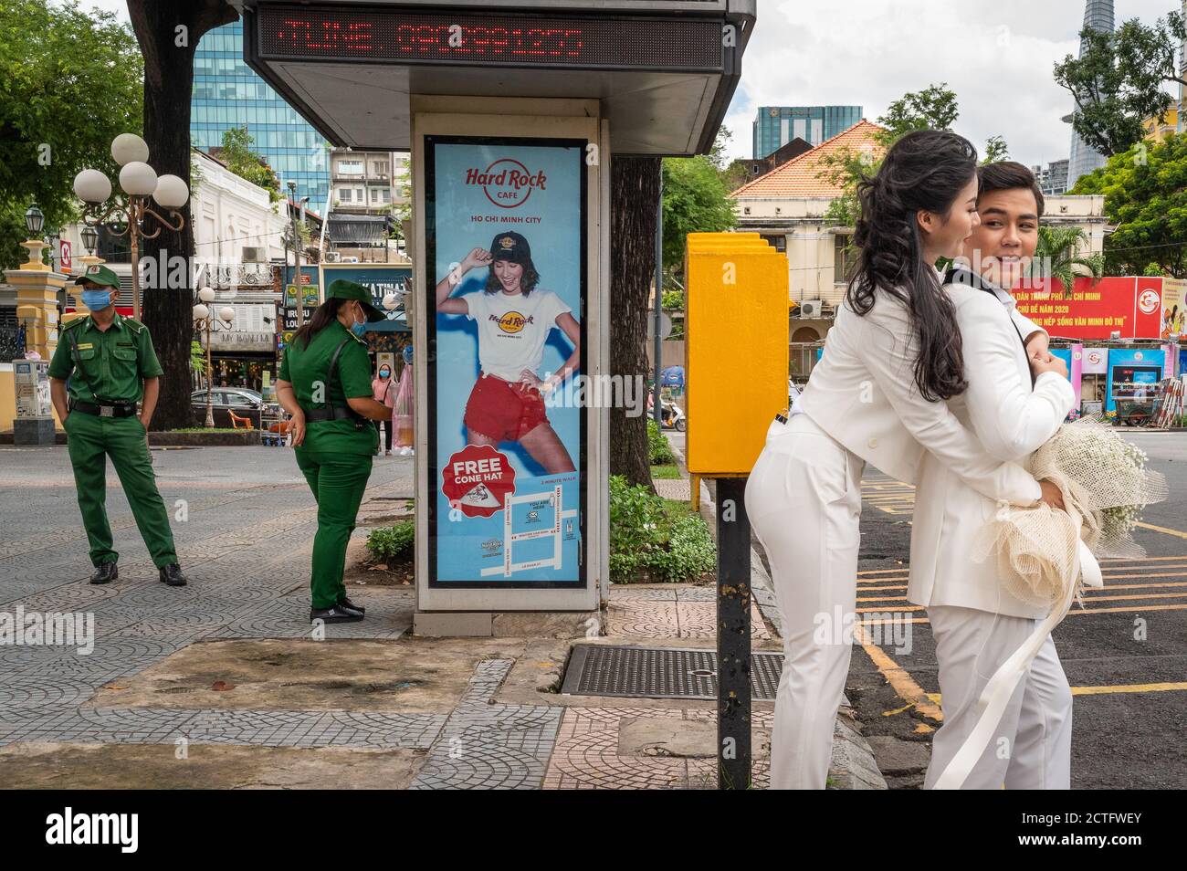 Newlyweds-to-be posing near the Saigon Central Post Office, Ho Chi Minh City, Vietnam Stock Photo