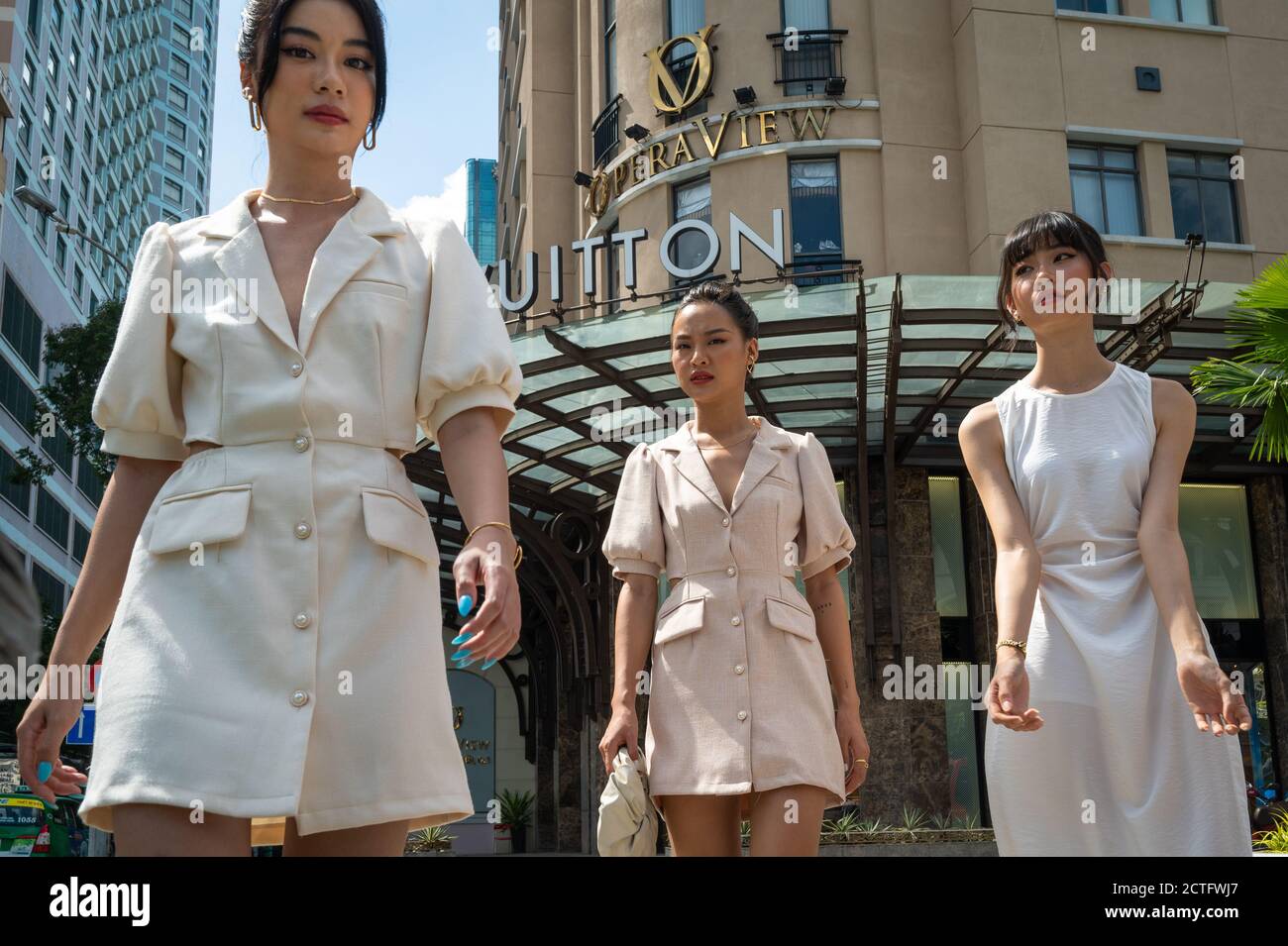Vietnamese walking models, Ho Chi Minh City, Vietnam Stock Photo