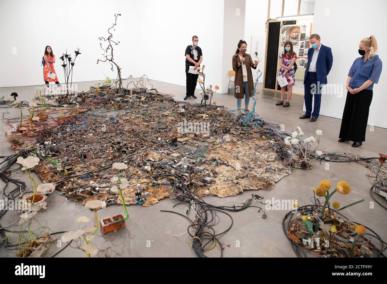 The End of Fun an exhibition by artist Kristof Kintera at the IKON gallery, Birmingham. Pictured, Postnaturalia. An artificial landscape made of discarded electrical components. The installation sprawls across the floor taking over the gallery like an invasive organism. Stock Photo
