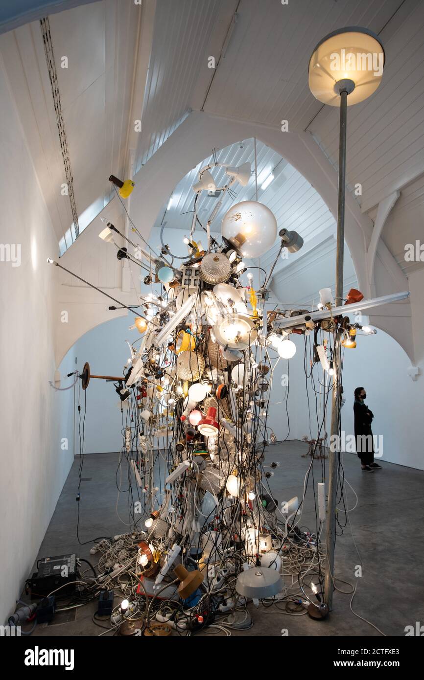 The End of Fun an exhibition by artist Kristof Kintera at the IKON gallery,  Birmingham.Pictured, My Light is Your Life. A four metre sculpture made up  of 250 recycled table lamps Stock