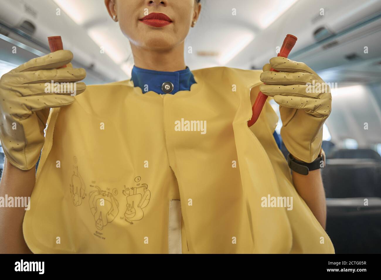 Flight attendant safety instruction hires stock photography and images