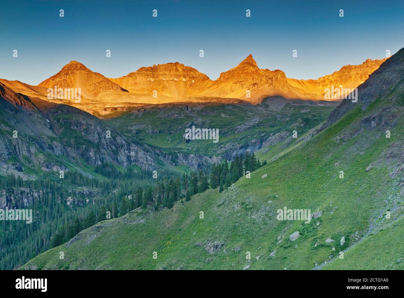Fuller Peak, Vermilion Peak and Golden Horn, view at sunrise from road to Clear Lake, San Juan Mountains, near Silverton, Colorado, USA Stock Photo