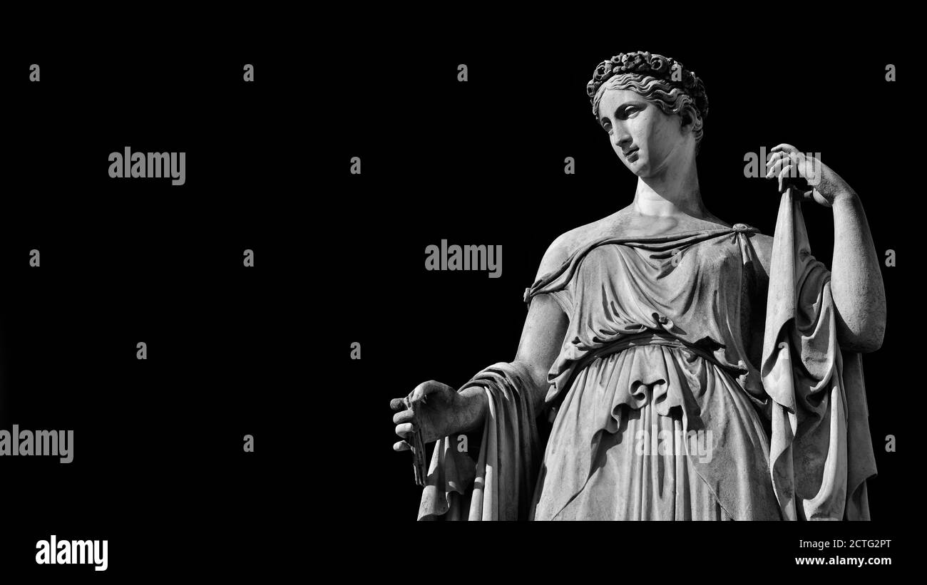 Paganism in Ancient Times. Roman or Greek goddess neoclassical marble statue, erected in the 19th century in Rome historic center (Black and White wit Stock Photo