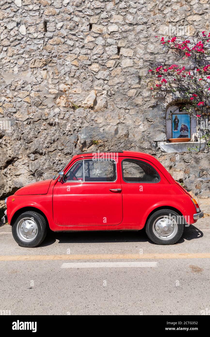 Old classic Fiat 500 car parked in a street of Praiano, Amalfi coast, Campania, Italy Stock Photo