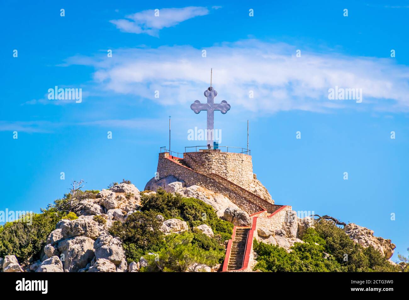Large Religious Cross on top of a hill in Karpathos Island, Greece Stock Photo