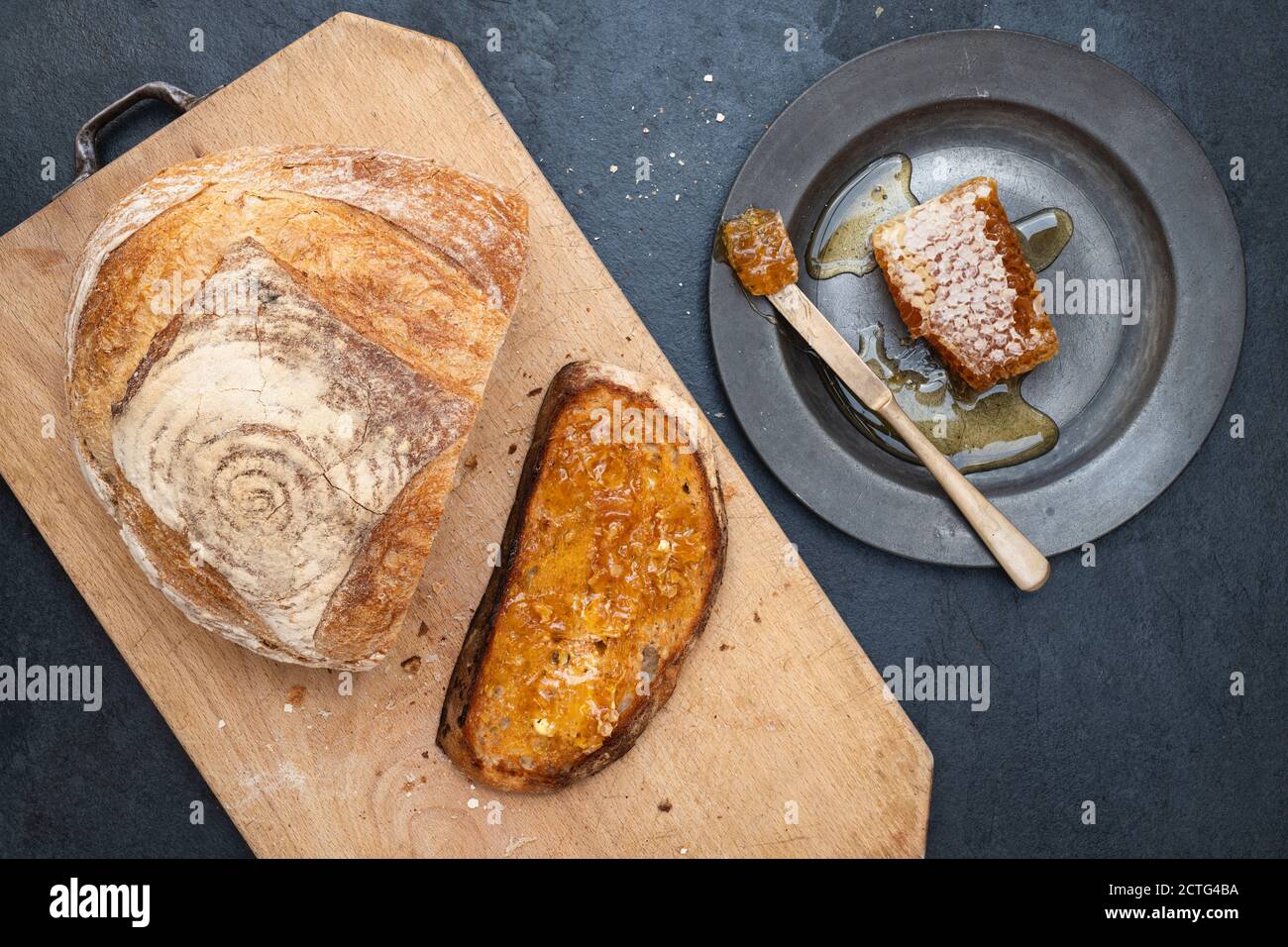 Sourdough toast with on a bread board. UK Stock Photo Alamy
