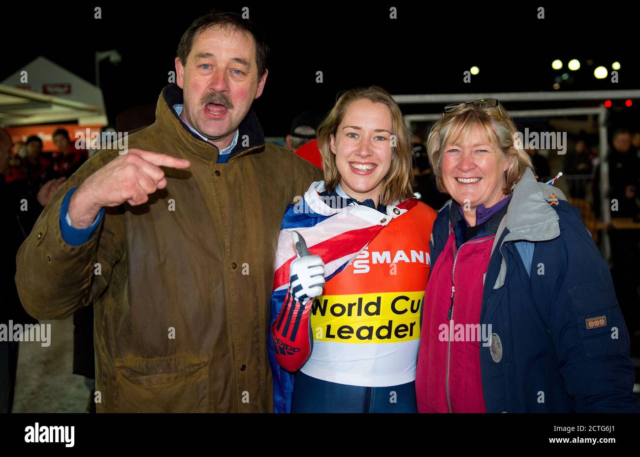 LIZZY YARNOLD CELEBRATES VICTORY WITH HER PARENTS CLIVE AND JUDITH. WORLD CUP SKELETON - IGLS, AUSTRIA. PICTURE CREDIT : © MARK PAIN / ALAMY Stock Photo