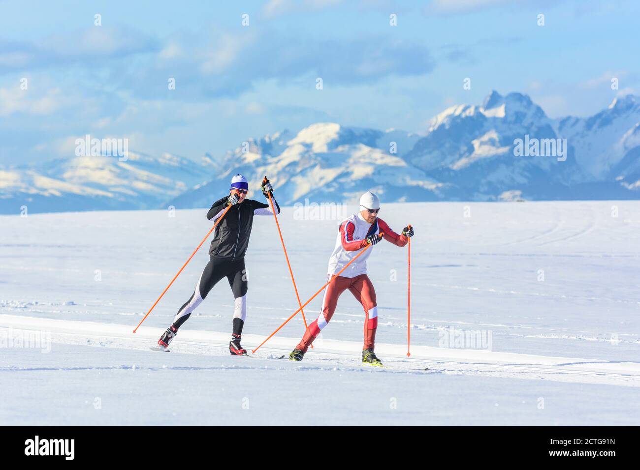 On the way on perfect slopes with cross-country skis Stock Photo