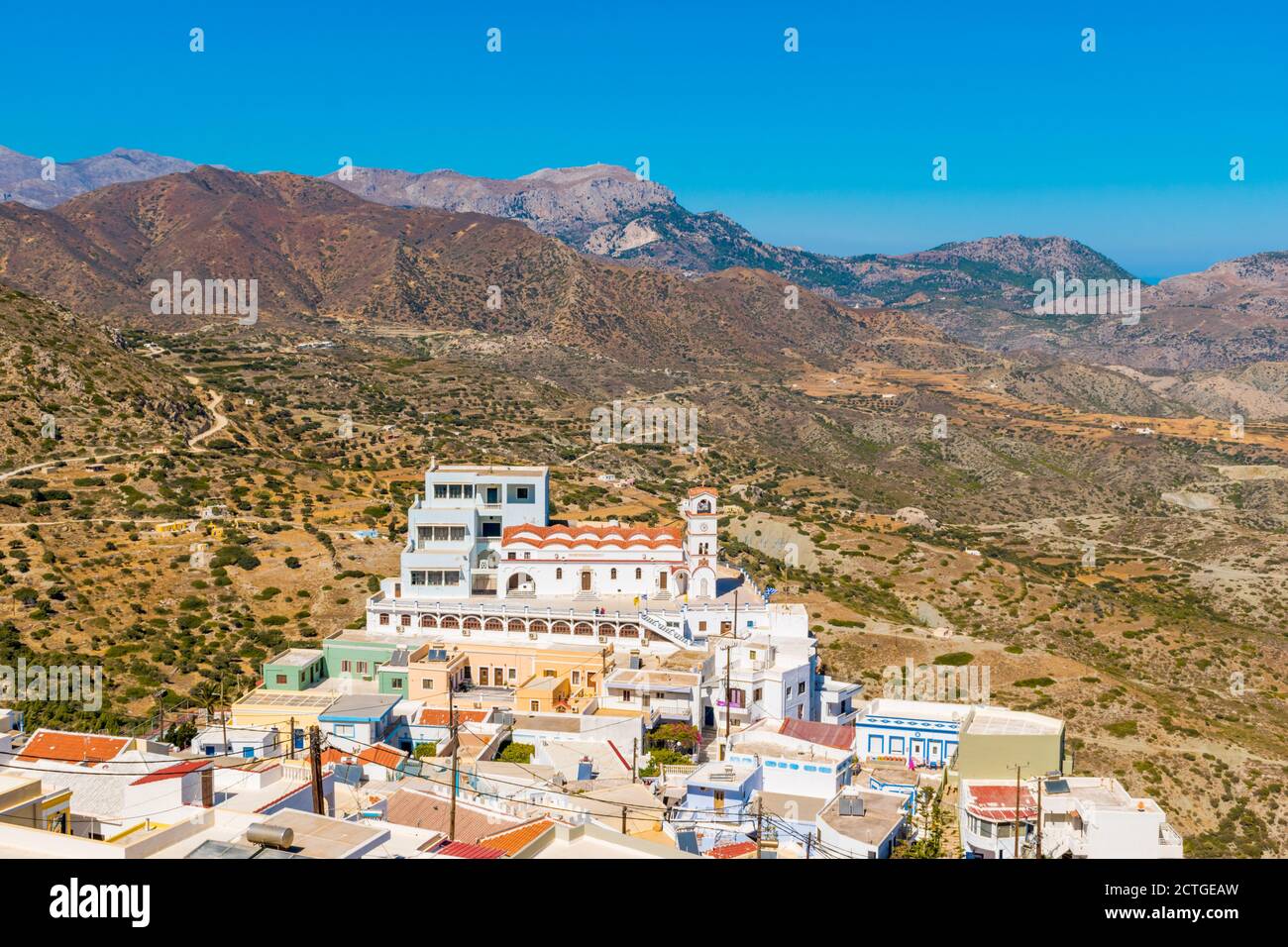 Famous Church of Dormition of Virgin Mary on a cliff in Menetes village, Karpathos Island, Greece Stock Photo