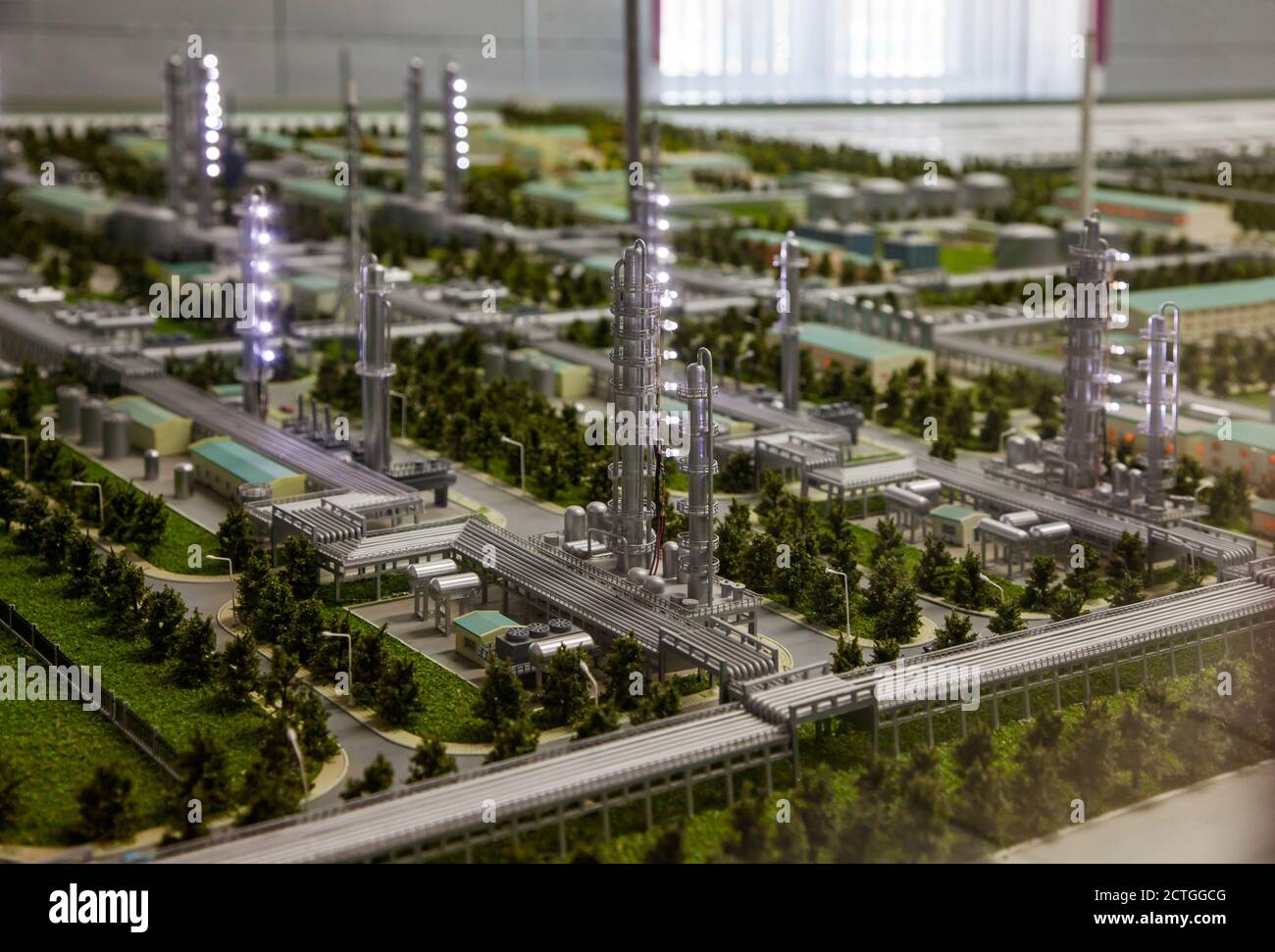 Aktobe region/Kazakhstan - May 04 2012: Scale miniature (maquette) of modern oil refinery and gas processing plant. Distillation columns with lights.. Stock Photo