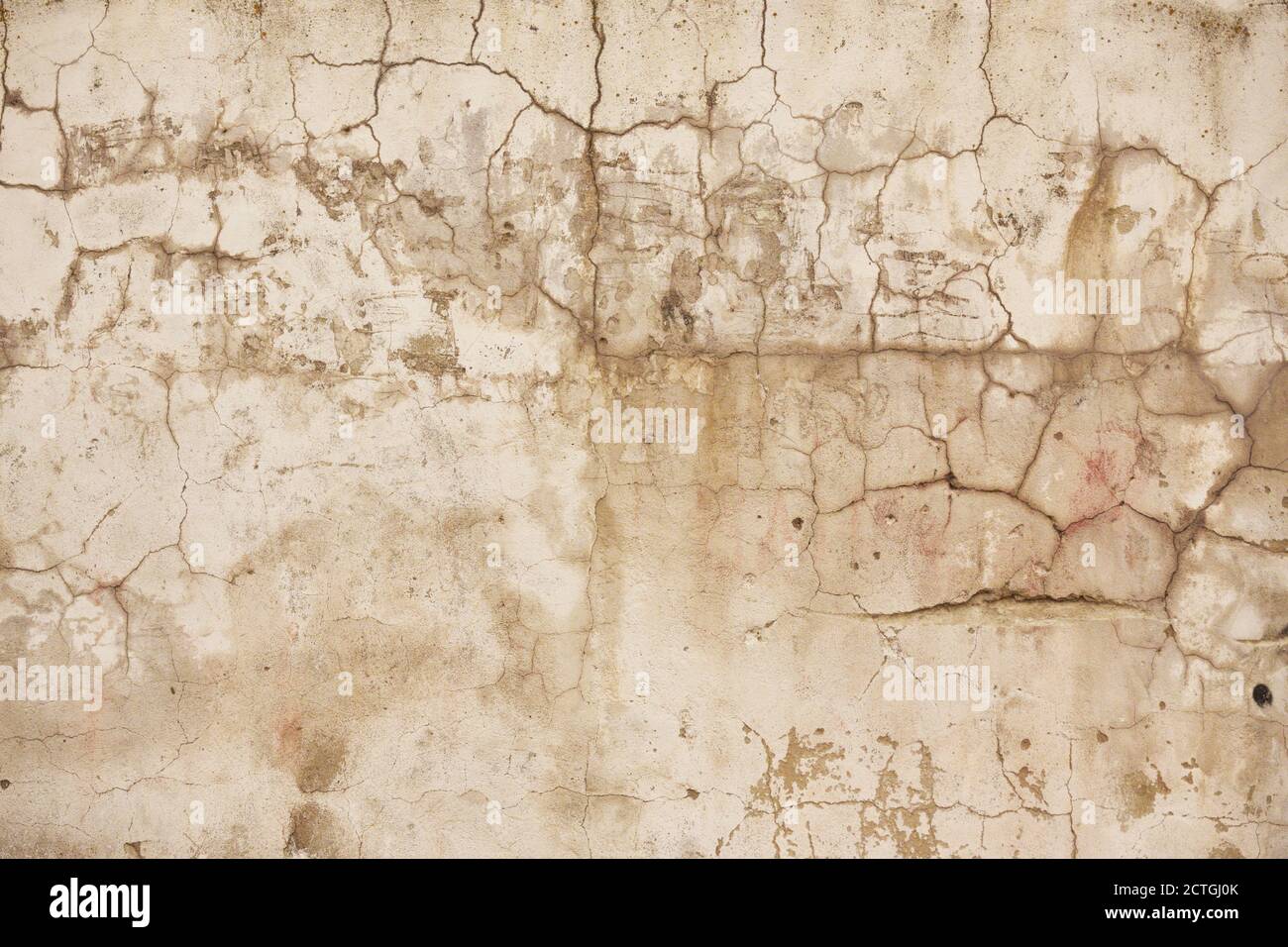 white wall with cracks. gray cement floor cracked Stock Photo