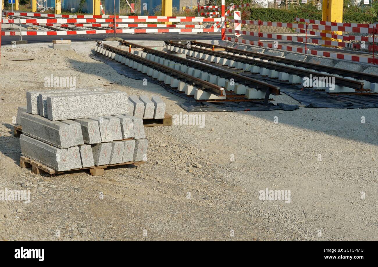 Close view on double railway tracks for street-line or street railway. Streetcar line in Urdorf, Switzerland is still under construction. Stock Photo