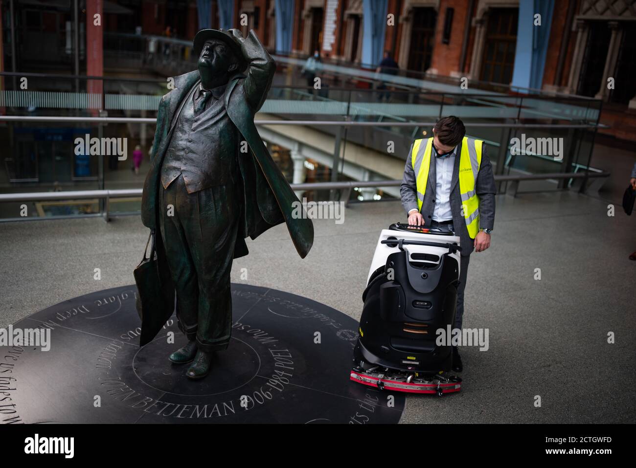 An Eco Bot 50 robot is programmed at St Pancras International, London as it is the first train station in the world to utilise high-tech cleaning robots to help eradicate viruses throughout the historical landmark's concourse and facilities. Stock Photo